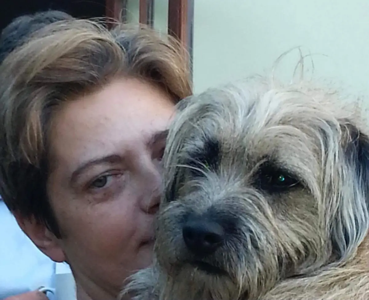 Antonia Noble at home with her dog